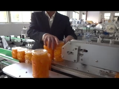 Applicatore di etichette per bottiglie quadrate in vetro per etichettatrici farmaceutiche automatiche